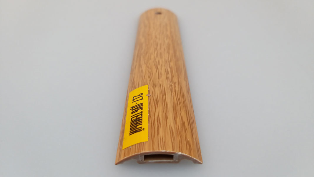 Ideal — Порог пластиковый Идеал 36x900 мм. 217 Дуб темный