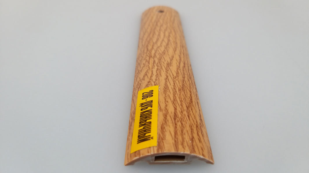 Ideal — Порог пластиковый Идеал 42x1600 мм. 206 Дуб коньячный